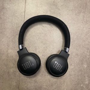 Over the ear JBL headphones.